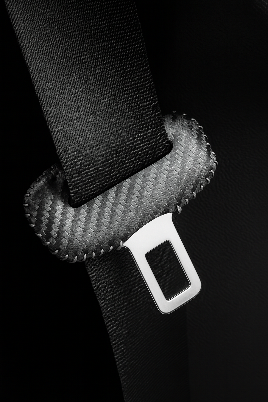 Carbon finish seatbelt buckle covers